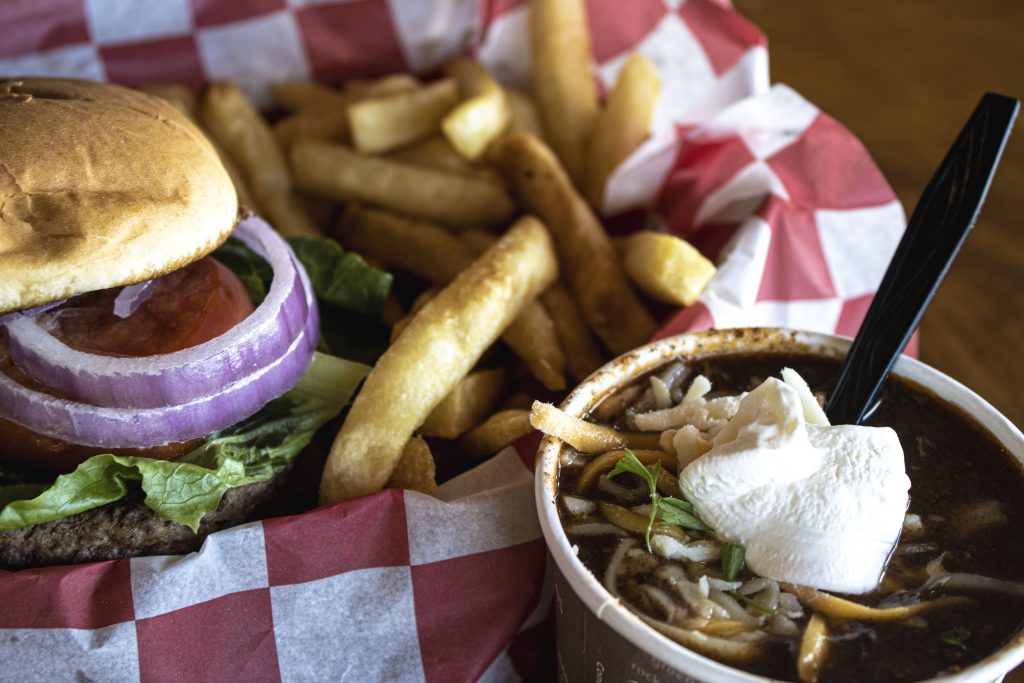 A burger, fries and a bowl of chili at Tips Up